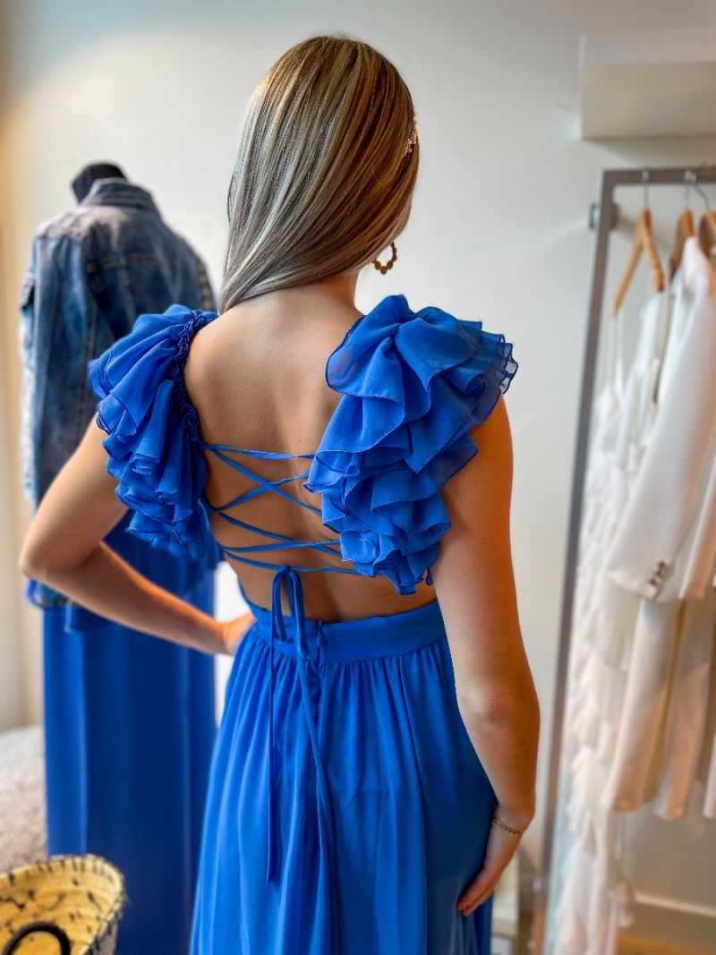 Blauwe jurk met off-the-shoulder details en haltertopje